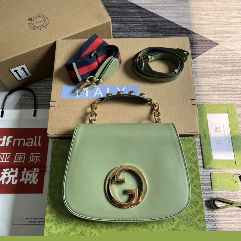 G*u*i top handle bags